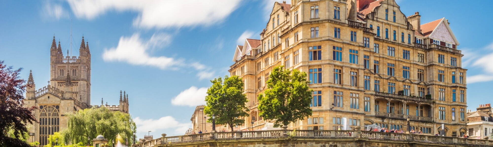 The Pulteney Bridge in Palladian style crosses the River Avon in Bath