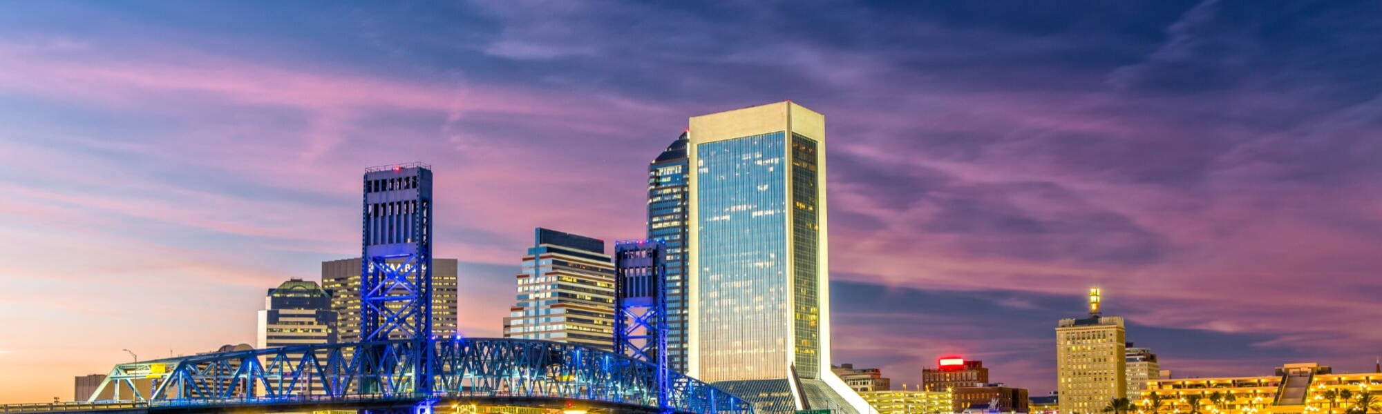 Skyline of Jacksonville, FL and Main Street Bridge at Dusk