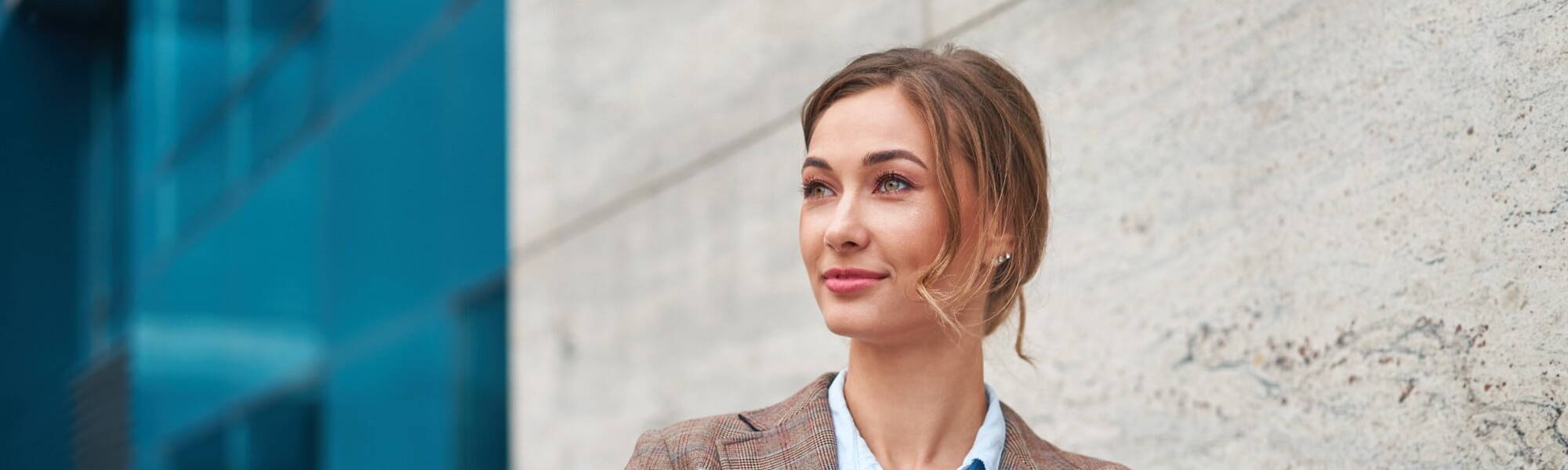 professional women in suit looking hopefull